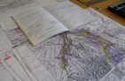 Manuscript map with notebook
